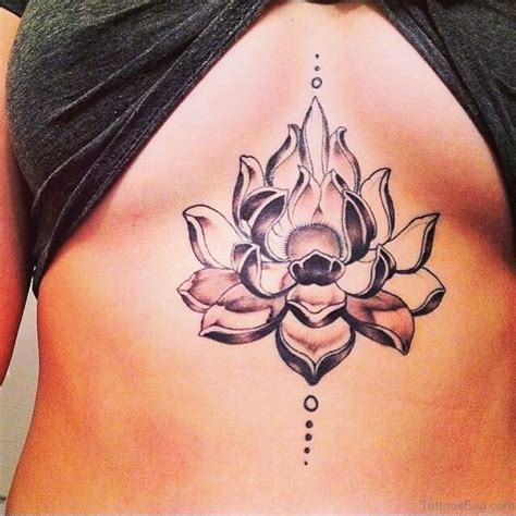 sternum lotus tattoo|feminine sternum tattoos.